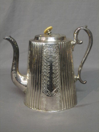 An oval engraved silver Britannia metal coffee pot