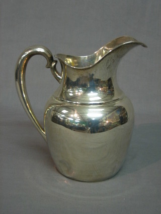 A Peruvian silver jug, the base marked Welsh Plata 900, 21 ozs