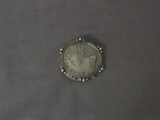 A Queen Anne 1707 silver crown mounted as a brooch