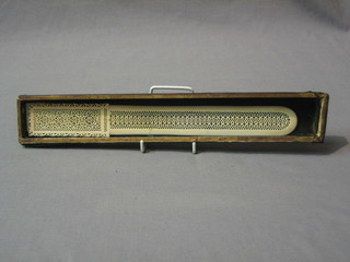 An Eastern pierced ivory "page turner"  11"