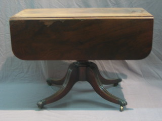 A 19th Century mahogany pedestal Pembroke table fitted a drawer and raised on pillar and tripod supports 39"
