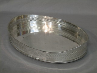 An oval silver plated galleried tea tray 14"