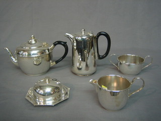 A 4 piece silver plated hotelware  tea service comprising teapot, hotwater jug, twin handled sugar bowl and milk jug together with a muffin dish