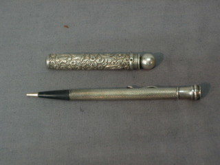 A propelling pencil by Albert Baker and 1 other