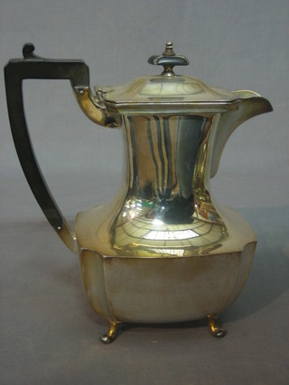 A Georgian style silver plated hotwater jug