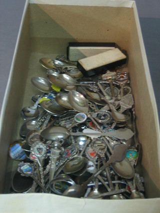 A quantity of various silver plated souvenir spoons