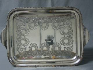 An engraved twin handled silver plated tea tray 23"