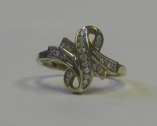 A gold ribbon shaped dress ring set diamonds