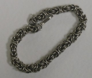 A silver multi link chain