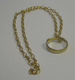 A 9ct gold ring hung on a belcher link chain