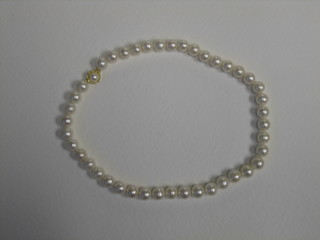 A rope of 42 large fresh water cultured pearls with 14ct gold clasp, 42cm long, 9.5mm diameter
