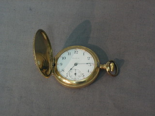 An Elgin Natl. Watch Company pocket watch contained in a gold plated case