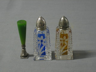 A seal together with 2 overlay glass pepper pots