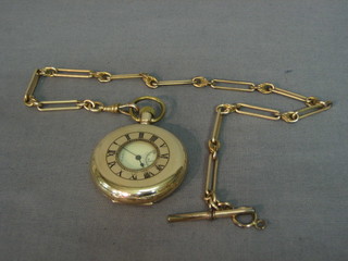 An American demi-hunter pocket watch contained in a gold plated case hung on a gold plated chain