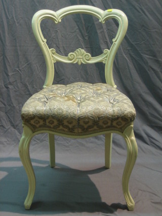 A Victorian mahogany  white painted balloon back chair with carved mid rail and upholstered seat, raised on French cabriole supports