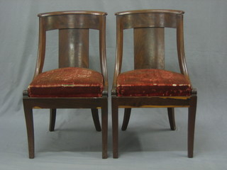 A pair of Biedermeier bar and slat back dining chairs