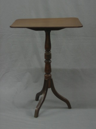 A Victorian rectangular mahogany wine table, raised on pillar and tripod supports 20"