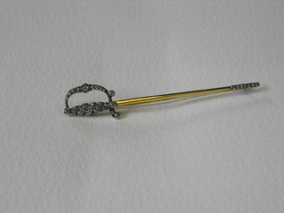An 18ct gold bar brooch in the form of a sword set numerous diamonds (approx 1.10cts