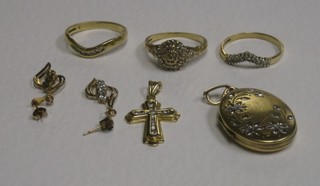 3 gold rings, a gold cross etc