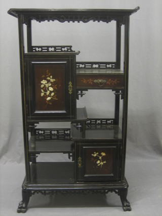 An Oriental lacquered Fujiama style cabinet fitted various shelves, drawers etc 39"