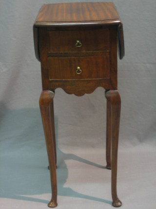 A Georgian style mahogany drop flap occasional table fitted 2 drawers and raised on cabriole supports 12"