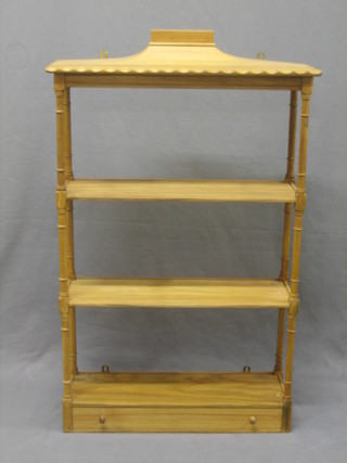 A Regency style bleached mahogany 3 tier hanging what not the base fitted a drawer 22"