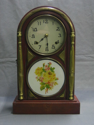A 19th Century Japanese striking shelf clock with 7" circular paper dial with Arabic numerals contained in an arch shaped wood grain finished case
