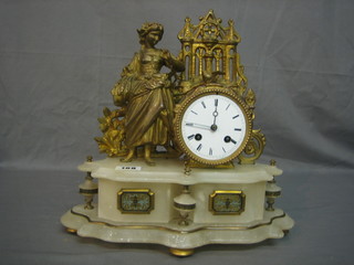 A Victorian French 8 day striking mantel clock in a gilt spelter and alabaster case