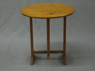 A circular pine snap top occasional table 18"