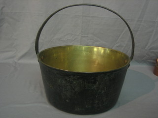 A copper preserving pan with iron handle