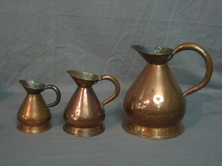 A set of 3 Victorian copper harvest measures, half gallon, pint and half pint