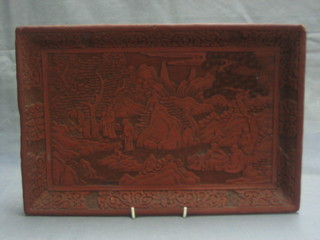 An Oriental 19th Century carved Redware tray decorated figures in a landscape 15"