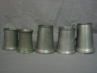 A 19th Century waisted pewter half pint tankard with glass base together with 4 other tankards