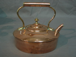 A circular copper kettle by Naple and Co ltd