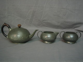 A planished pewter 3 piece tea service by W & Co English Pewter