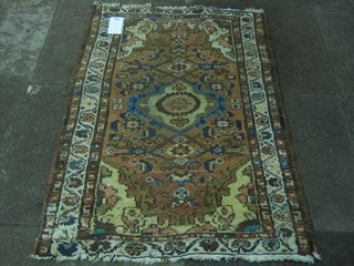 A Caucasian rug with central diamond within multi row borders 40" x 26" some wear