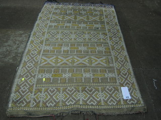 A Caucasian style rug with all over geometric design 60"x36"