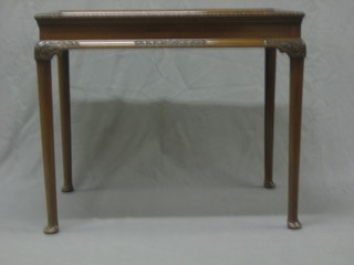 An Edwardian rectangular mahogany silver table raised on club supports 29"