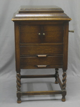A Standard gramophone contained in an oak case