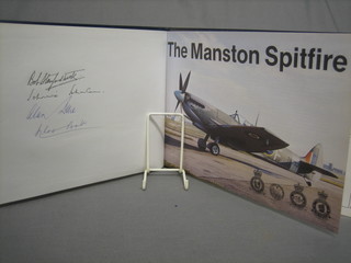 A limited edition "The Manston Spitfire" signed by Douglas Bada, Air Commodore Alan Deere, Air Vice Marshall James Johnson and Wing Commander Robert Stanford Tuck