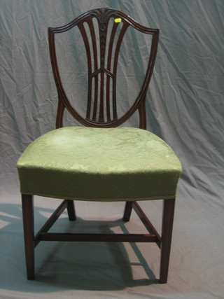 A 19th Century Hepplewhite style camel back dining chair, raised on square tapering supports