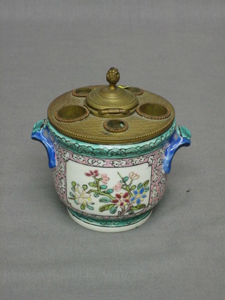 A famille vert cylindrical twin handle porcelain ink well with floral panels set a gilt metal inkwell to the centre 3"