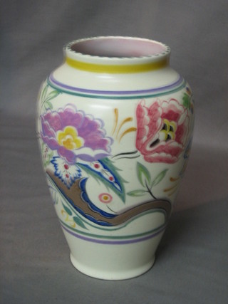 A circular Poole Pottery vase with stylised floral decoration, base incised 512 and impressed Poole Pottery mark 7 1/2"