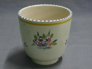 A Poole Pottery cylindrical jardiniere with floral decoration, the base with Dolphin mark 4"