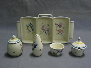 A Poole Pottery 3 division hors d'eouvres dish, the base marked Poole Pottery, a Poole Pottery mustard pot, 1 other mustard pot, do. salt and pepper