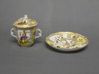 A Dresden twin handled invalids cup and cover with panelled decoration, decorated romantic scenes (base f)