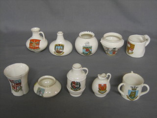 A Goss crested china model of a Scak bottle decorated the arms of Winton together with 10 items of crested china