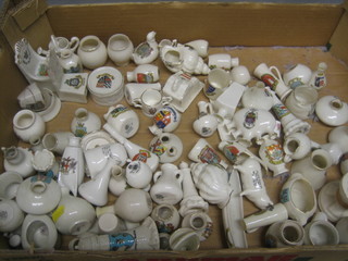 A collection of various items of crested china