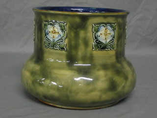 A circular green salt glazed jardiniere made for P&O, the base marked 5085 P&O 7"
