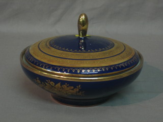 A 20th Century circular KPM blue and gilt patterned jar and cover 7"